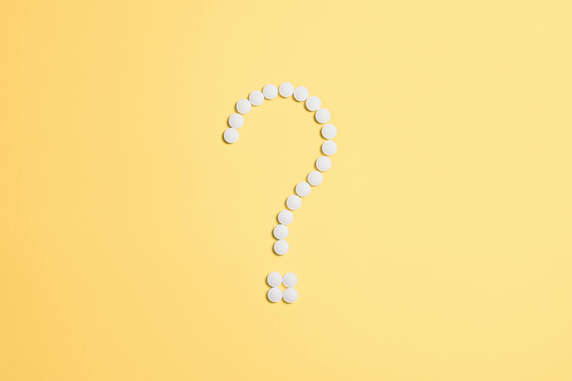 pills fixed as question mark sign